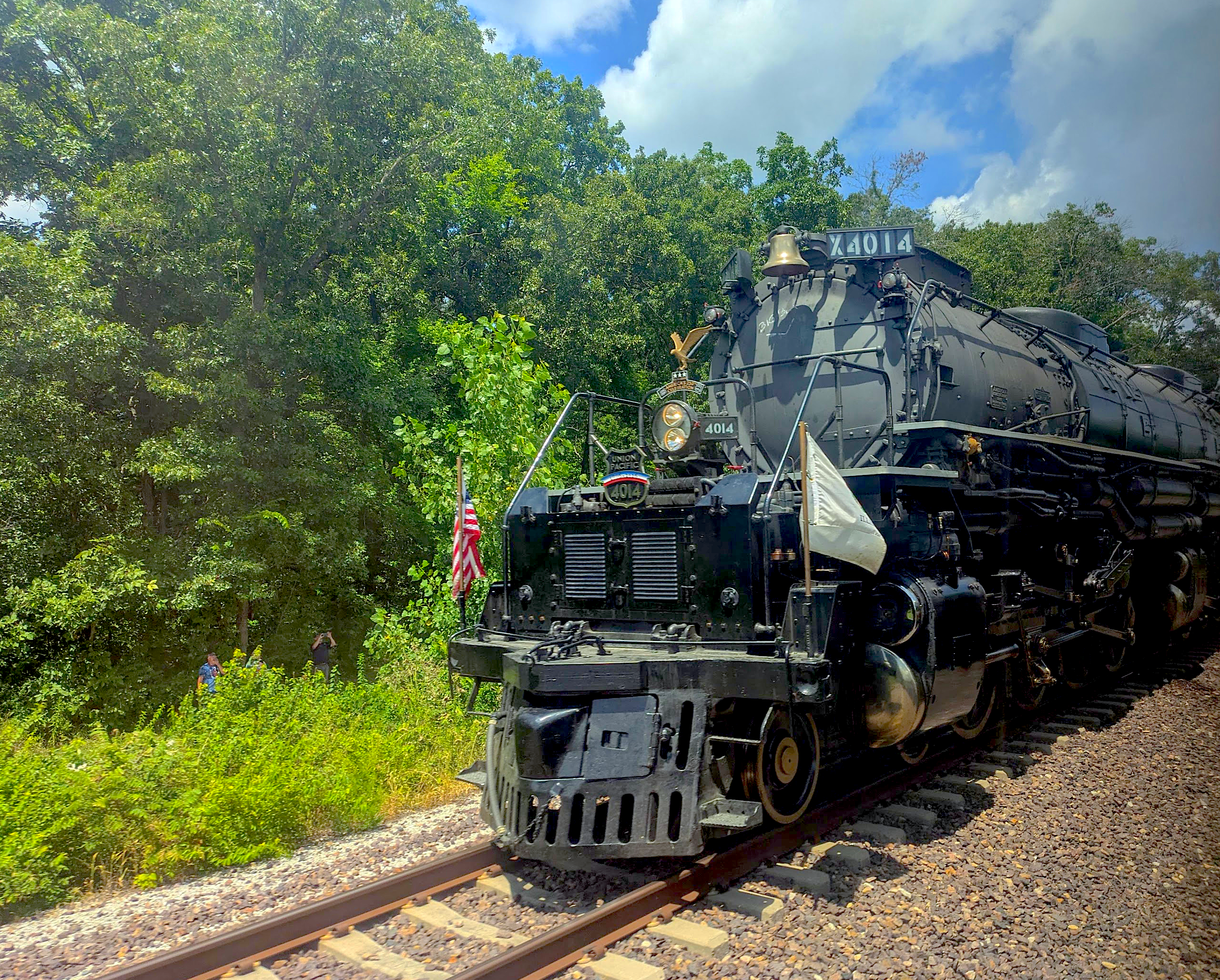 Union Pacific Big Boy No. 4014 steam locomotive passing the train